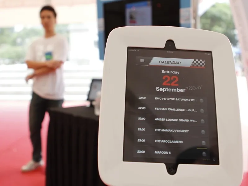 iPad kiosk displaying F1 Singapore Grand Prix schedule